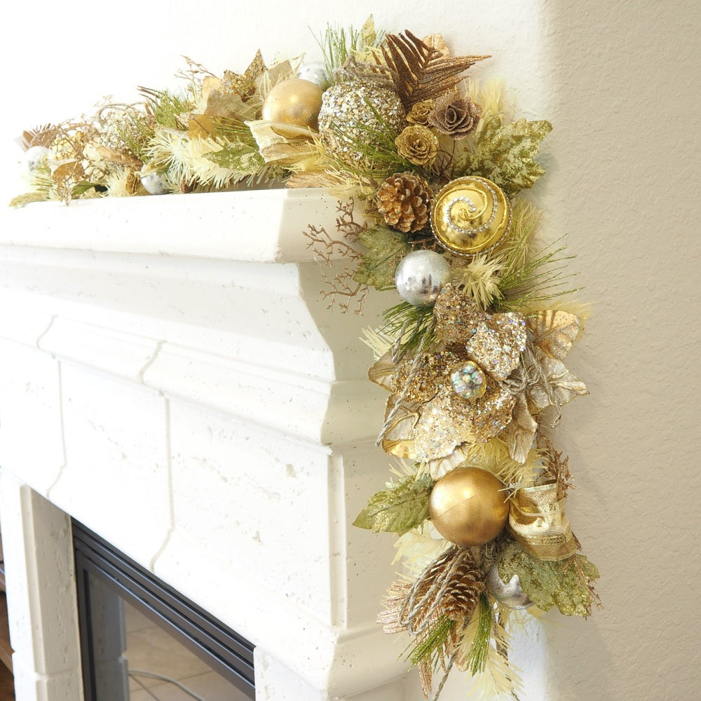 Handcrafted Champagne Gold Poinsettia Christmas Garland with glittery golden poinsettias, pinecones, mini roses, jeweled ornaments, and faux foliage.